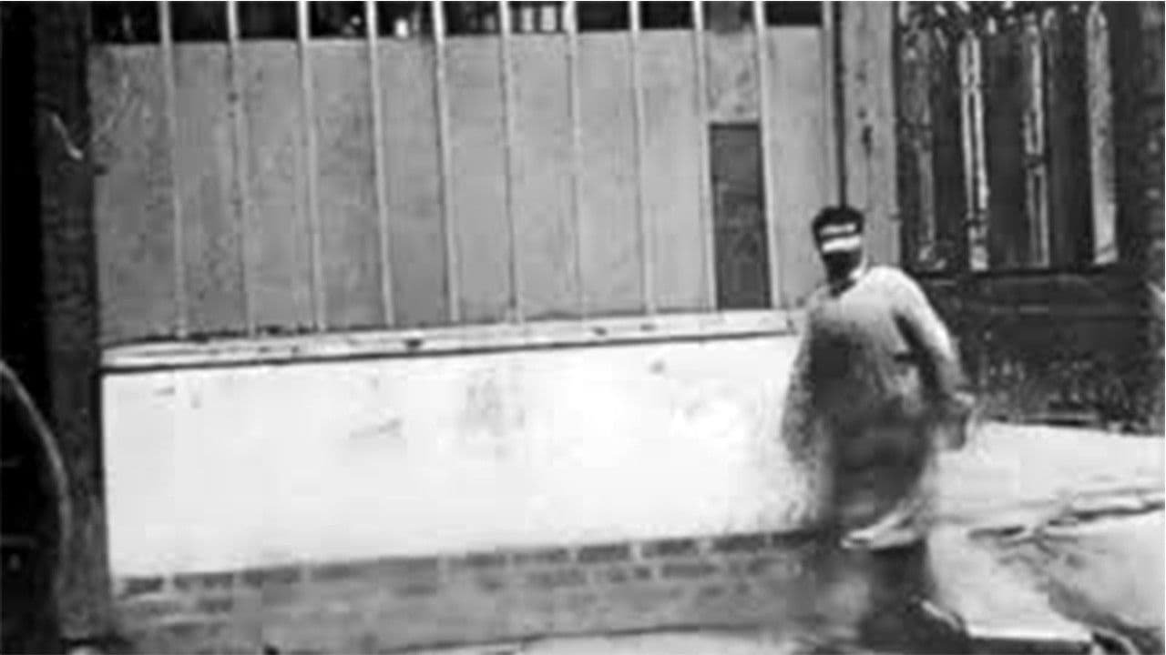 Man Walking Around a Corner