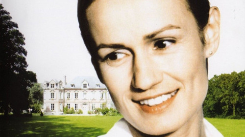 Une femme en blanc Bild 1