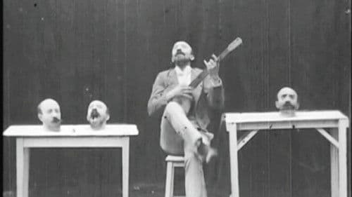 Un homme de têtes Bild 1