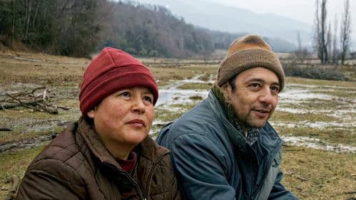 Sentados frente al fuego Bild 1