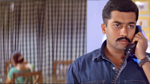 காக்க காக்க Bild 5